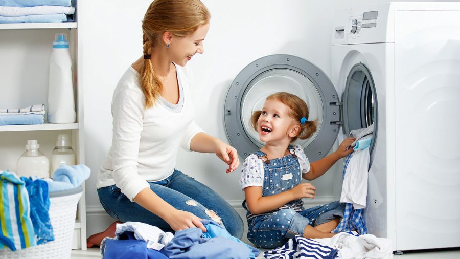 Mother & Daughter Doing Laundry